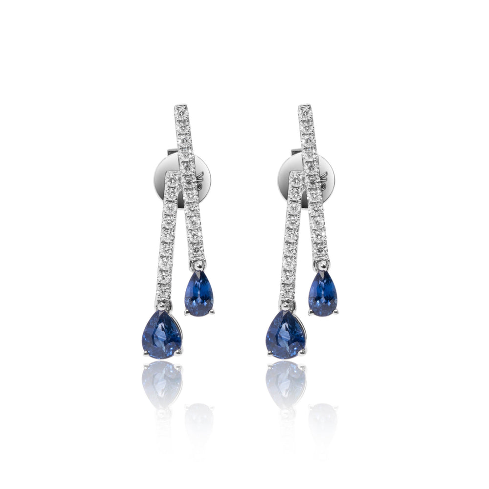 Pear shaped sapphire and vertical diamond stud earrings in 18k white gold
